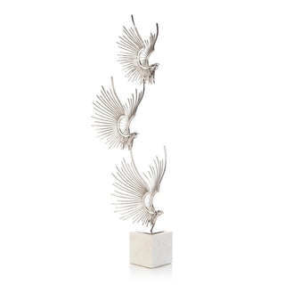 SCULPTED BIRDS IN FLIGHT