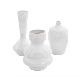 SET OF THREE WHITE CHISELED VASES