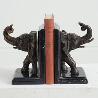 Elephant bookends on marble base